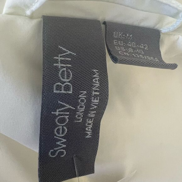 Sweaty Betty Down Puffer Jacket in Lily White US 8-10 Medium MSRP $348 - Picture 5 of 10